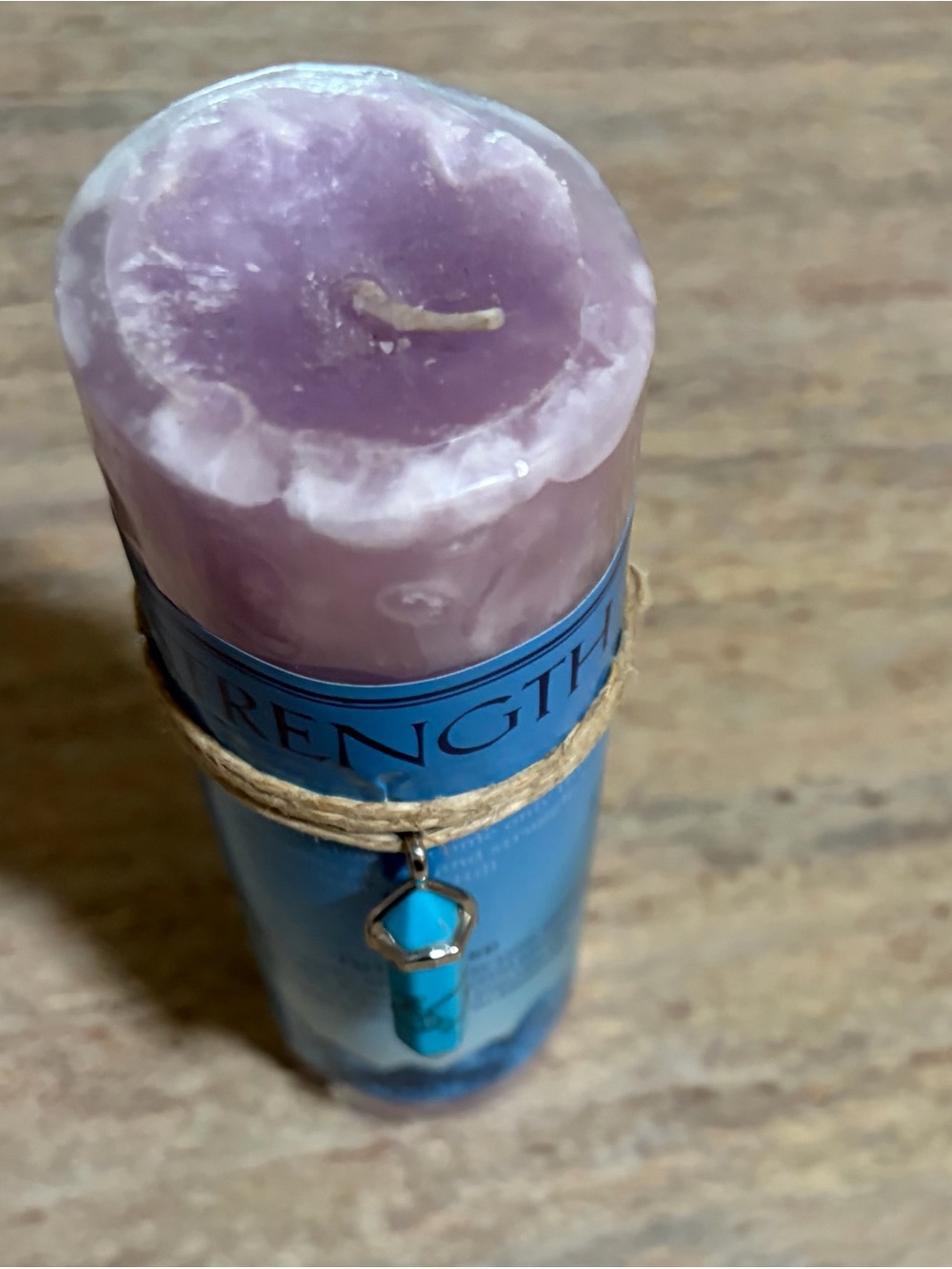Strength Lavender Pillar Candle with Turquoise Charm with twine for a necklace.